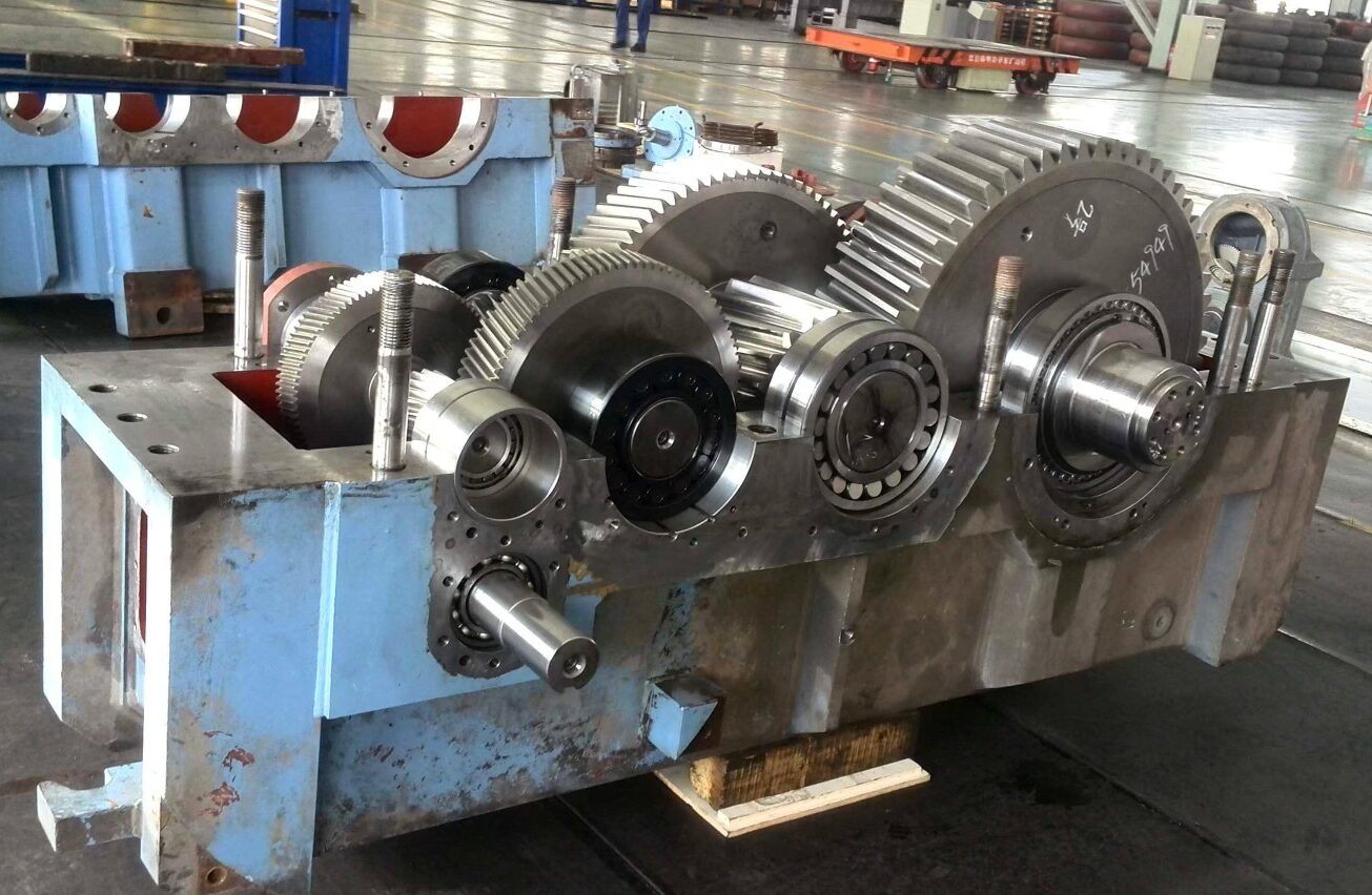 What role does the mechanical strength of the material play in gearbox housing selection?